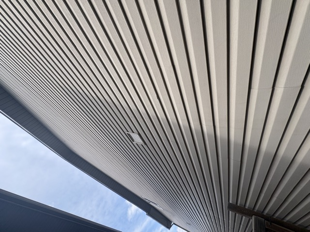 Grey horizontal siding, close up