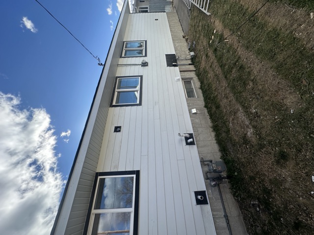 White siding on a bungalow